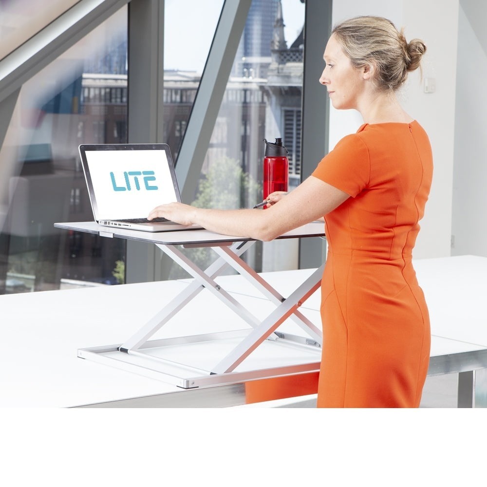 yo yo desk lite, portable desk riser in office